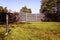 Lantern, green lawn and fence, photo filter