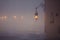 Lantern on market square in Krakow at morning fog