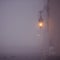 Lantern on market square in Krakow at morning fog