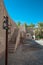 Lantern and ruins of the wall of Nizwa Fort, Oman