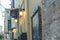 Lanterns on the authentic narrow colorful mediterranean street in the Chania town at the dusk. Island of Crete