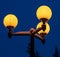 Lanterns burning on a pole at night in the park