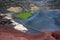 Lanzarote, black volcanic beach surrounded by colo