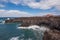 Lanzarote landscape. Los Hervideros coastline, lava caves, cliffs and wavy ocean.