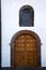 lanzarote spain canarias brass brown knocker and white wall ab