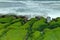 Laomei Green Reef, volcanic rocks with seasonal algae in Shimen District, New Taipei City,