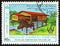 LAOS - CIRCA 1987: A stamp printed in Laos shows house on stilts, circa 1987.