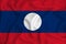 Laos flag on the background texture. Concept for designer solutions