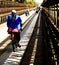 Laos Girl drive bicycle croos Loas Bridge