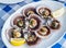 `Lapas` or true limpets with green moyo - traditional seafood of Tenerife and Madeira Islands