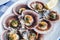 `Lapas` or true limpets with green moyo - traditional seafood of Tenerife and Madeira Islands