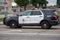 A LAPD Traffic patrol vehicle sits in the middle of the road at a traffic accident investigation