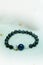 Lapis lazuli bead and Labradorite Crystal lucky stone bracelet bead on white towel background.fashion with believe in Add charm,pr