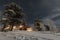 Lappish moonlit winter landscape, welcoming lights from the Hotel