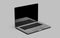 Laptop with blank screen isolated on gray background. Whole in focus. 4