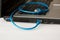 Laptop and blue networking cable