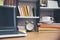 Laptop and book on School table for student study for exam in library. Wooden desk with desktop laptop notebook book and diary,