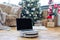 laptop at christmas and robot vacuum cleaner