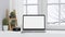 Laptop computer blank screen mockup in white minimal working space design