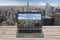Laptop computer with New York skyline