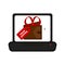 Laptop displaying a gift. Online shopping