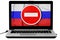 Laptop with a do not enter sign and a russian flag on the screen isolated on white.