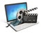 Laptop with films reel and movie clapper, Video or movie online internet concept 3d rendering