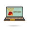 Laptop icon with bitcoins money falling in to a purse and standing before it.