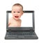 Laptop with laughing baby