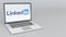 Laptop with LinkedIn logo. Computer technology conceptual editorial 3D rendering