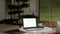 Laptop mockup is on a round table over blurred backgrounds of Japanese zen living room style