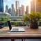 Laptop screen mockup on the wooden table, blurred cityscape background view