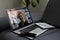 Laptop screen with multi-person conference, collage of group of multiracial people, webcam view, video chat. A lot of