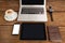 Laptop, smartwatch, smartphone and digital tablet with cup of coffee