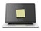 Laptop with yellow stick note