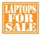LAPTOPS FOR SALE, text written on orange stamp sign
