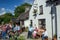 Laraugh,  Ireland - JULY 04,  2005: People dancing and drinking outside a famous pub in the Beautiful village of Lauragh situated