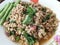 Larb chicken salad. Traditional Thai food, with ground chicken lime, chili and herbs. This food is popular in the north-east of th
