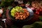 Larb Sausage with Chili Spring onions and lettuce in a black plate