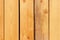Larch boards, wall panels of the ecological house. Structure of larch wood. Place for text.