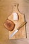 Lard, knife and rye bread on cutting board