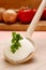Lard with parsley on a wooden spoon