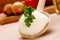 Lard with parsley on a wooden spoon