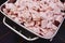 Lard, pork or ground beef in metal containers in food production