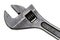 Large adjustable wrench on a white background. Insulated object. Old worn tool for mechanic. Metal texture close-up