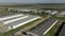 Large agricultural enterprise, agricultural company. large area with warehouses, elevators and laboratories. View from