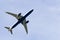 Large airplane approaching the airport and preparing to land, California