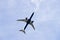 Large airplane approaching the airport and preparing to land, California