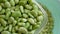 a large amount of fresh broad beans, broad beans, in a bowl