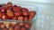 Large amount of ripe oleaster fruits, oleaster fruits in a glass bowl